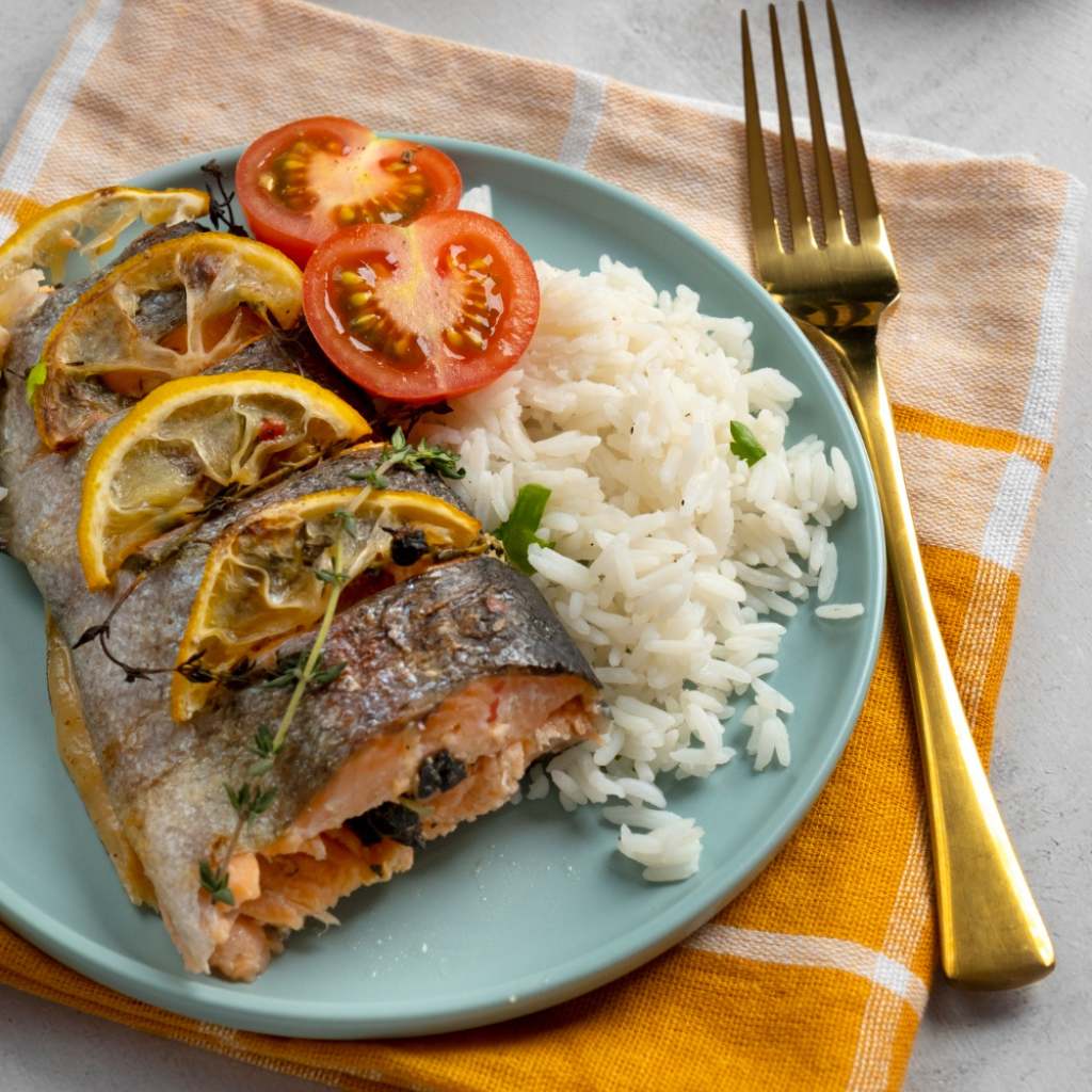 Salmon Dinner (over yellow rice + 2 sides)